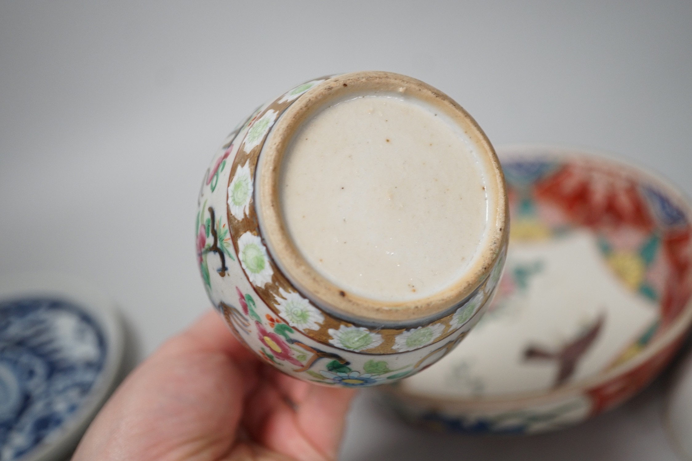 A Chinese famille rose bottle vase, 17cm tall, together with a group of oriental porcelain